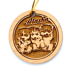 Huskies birch ornament. Size 2 x 2 x 3/16. Birch ornament made in Alaska.