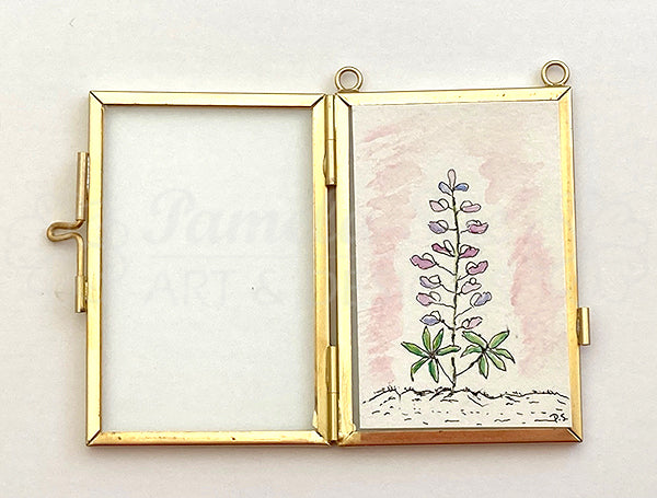Framed mini Lupine botanical art prints are hand drawn and illustrated by Alaskan artist, Pamela Sue. Lovely, original wall art with floral illustration and gold chain or ribbon. View all choices at PamelaSueArtandDesigns.com