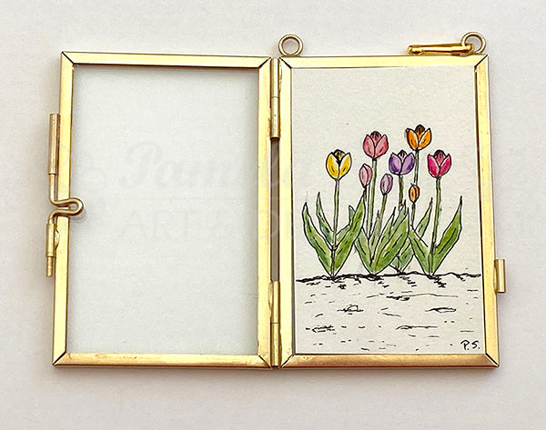 Framed mini Tulip botanical prints are hand drawn and illustrated by Alaskan artist, Pamela Sue. Lovely wall art with floral illustration and gold chain or ribbon. View all choices at PamelaSueArtandDesigns.com