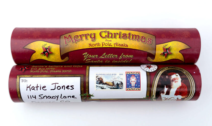 Ready to send Santa Letters from Alaska come enclosed in our custom North Pole tube, featuring a photo of Santa, a colorful banner wishing your child a Merry Christmas, and a lovely snowflake pattern in the background. 