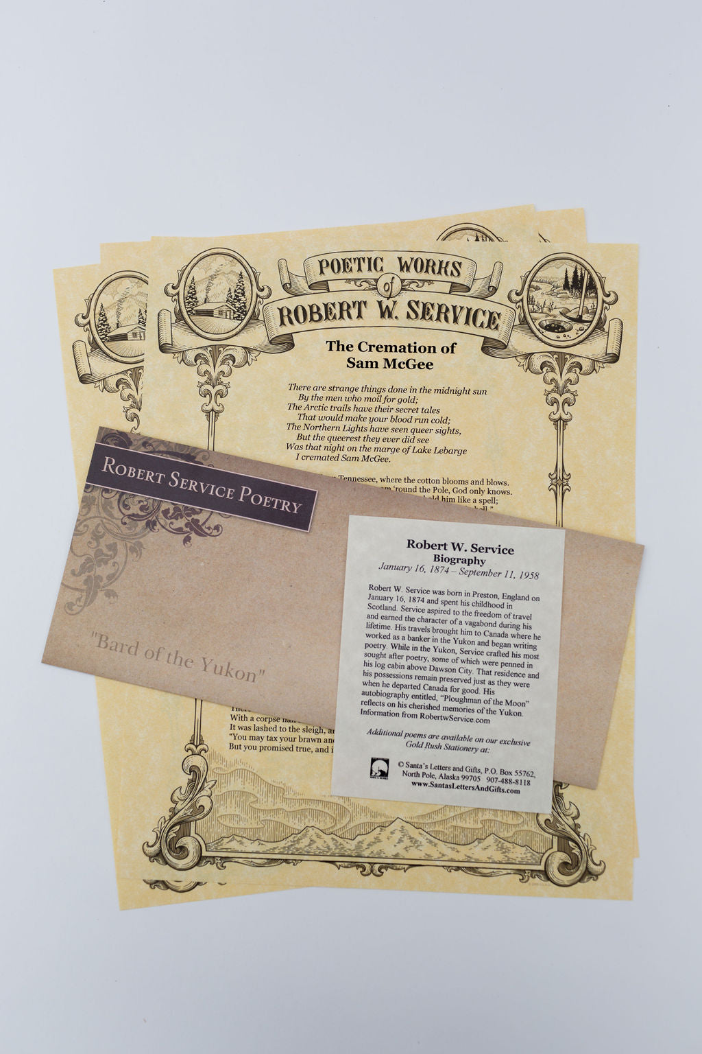 Purchase the Bundle of 4 Service Poems and save 15%! Poems are printed on our gold rush stationery from commissioned artwork, featuring Robert Service's cabin in Dawson, Klondike gold rush elements, and the Northern Lights swirling over the hills in Dawson, Yukon. Ornate design printed with black and metallic gold ink on parchment paper. Poems enclosed in vintage designed envelope with short bio. Available from PamelaSueArtandDesigns.com - Alaska.